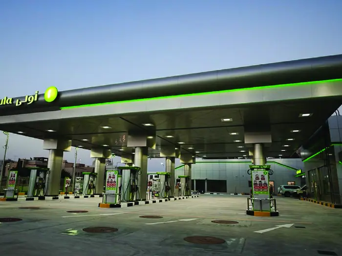 Oula petrol filling station forecourt at dusk