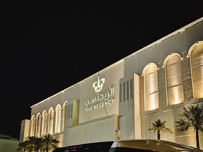 The Regency Hotel facade at night